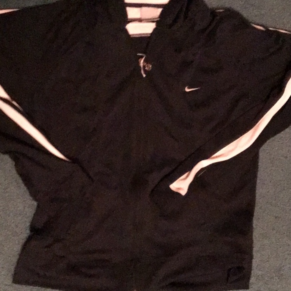 Nike wind jacket blue in color